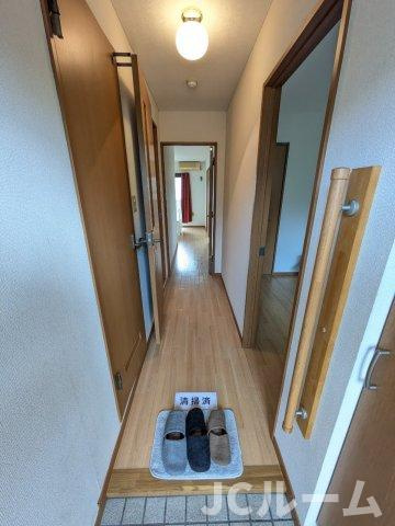 柏崎市西山町鬼王の賃貸マンションの玄関