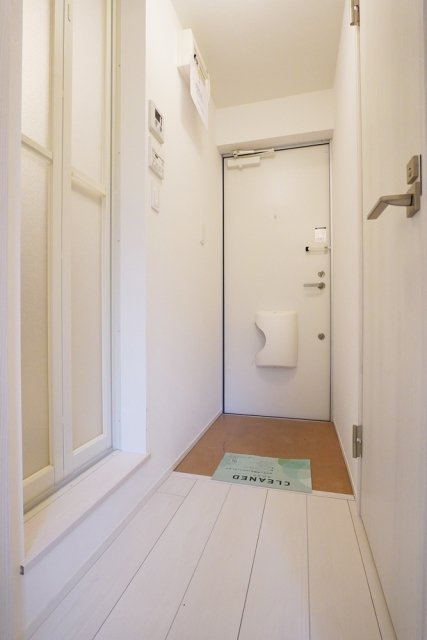 オーパスワン松庵の玄関