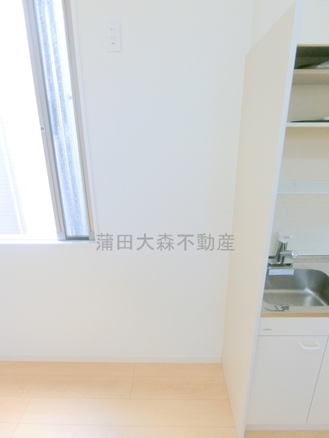 FS新蒲田2丁目ApartmentHouseのキッチン|冷蔵庫置き場