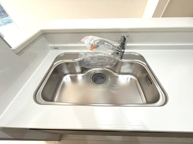 あきる野市引田　新築戸建全8棟のキッチン|浄水器付きシンク