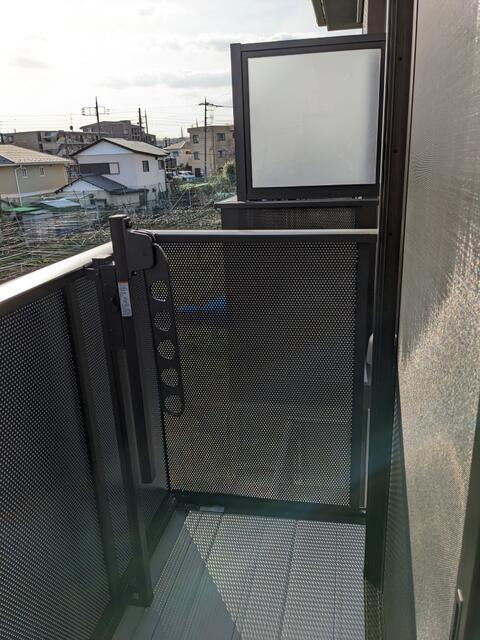 川崎市多摩区布田のアパートのバルコニー