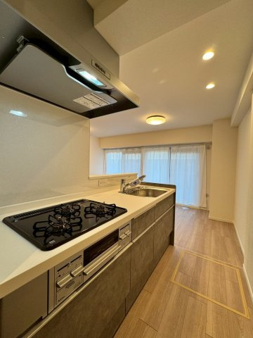 メロディーハイム守口のキッチン|対面式キッチンでご家族の会話も弾みます。