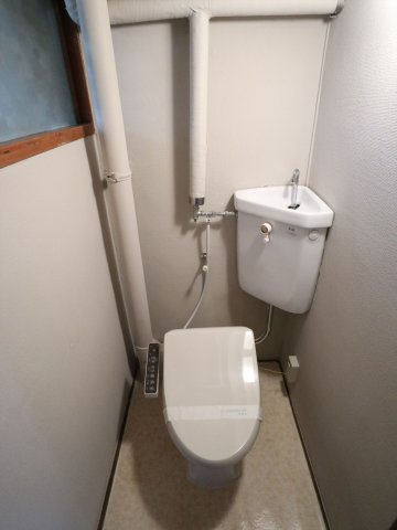 磯松マンションのトイレ|※写真は別の部屋のものです。