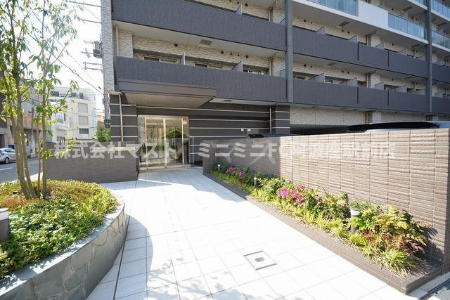 大阪市西区九条南３丁目の賃貸マンションのエントランス