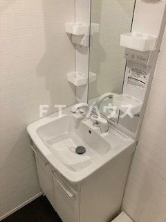 Likes飯山満町A棟の洗面所