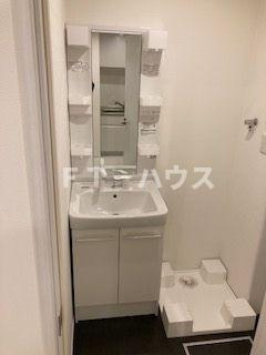 Likes飯山満町A棟の洗面所