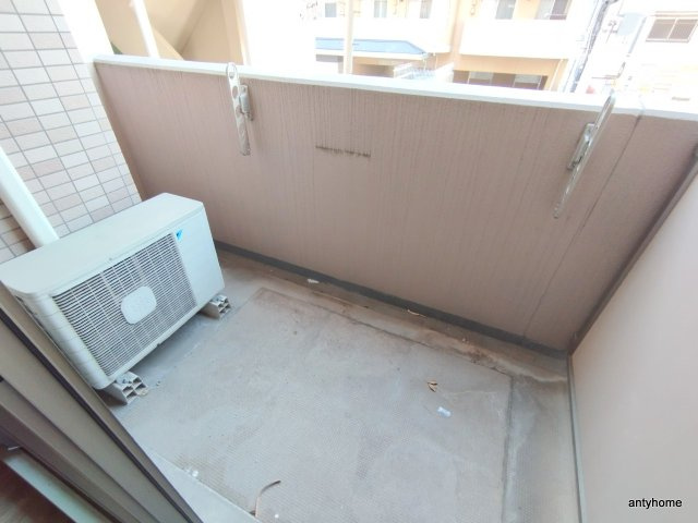 パセオ十三東　仲介手数料無料のバルコニー