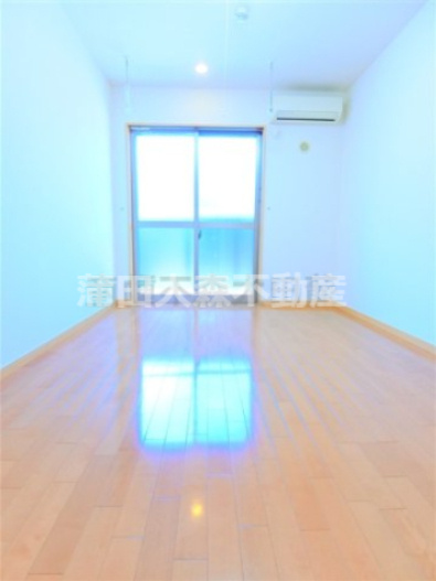 フレンドリーWESTの居間・リビング|東向きの洋室8.7帖