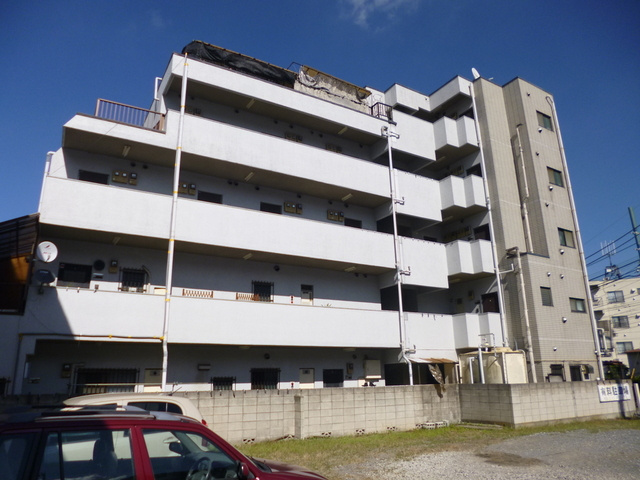 メゾン塚本の外観|きれいなタイル貼りの賃貸物件です。