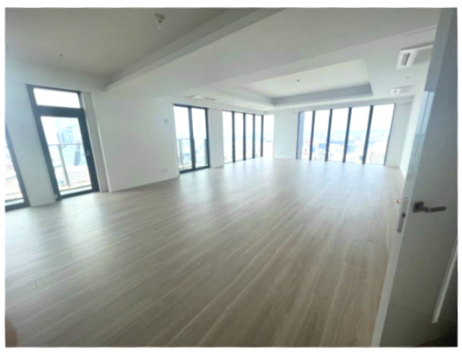 NAGOYA the TOWERの居間・リビング|窓面が広く、都心を一望する伸びやかなLDK