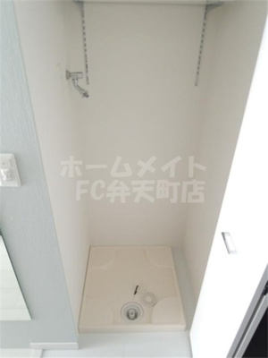 【設備】 | グランパーク大阪WEST | 室内洗濯置場です