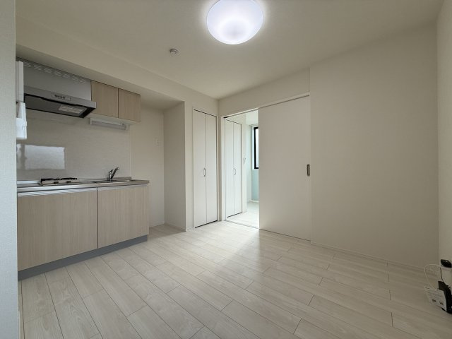 ハーモニーテラス遠里小野Ⅲの居間・リビング