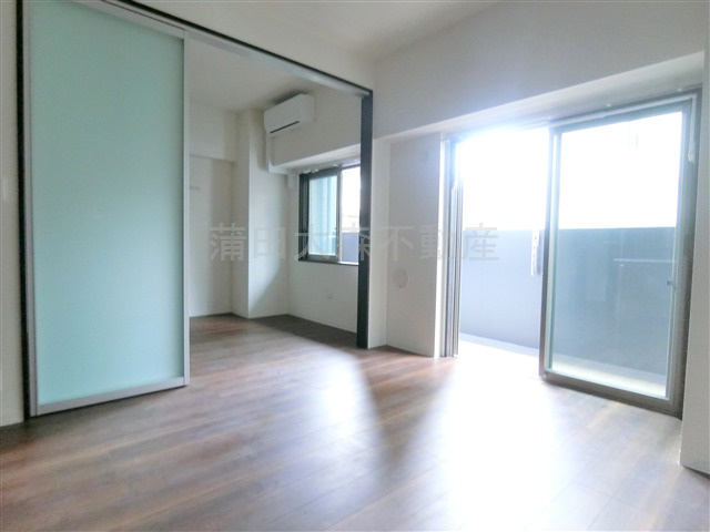 グランシャリオ新蒲田の居間・リビング|カウンターキッチンのLDK11帖　リビングダイニングキッチン