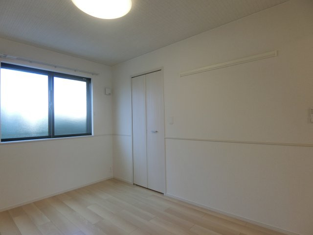 ヒカルサ境港外江町イーストⅠの洋室