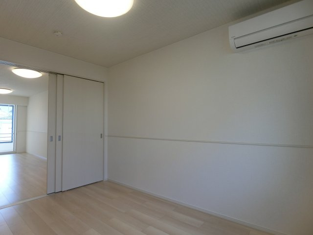 ヒカルサ境港外江町イーストⅠの洋室