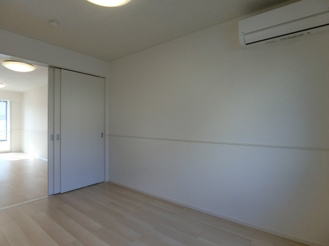 ヒカルサ境港外江町イーストⅡの洋室