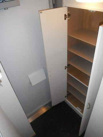 レオパレスソレイユ日比野の玄関