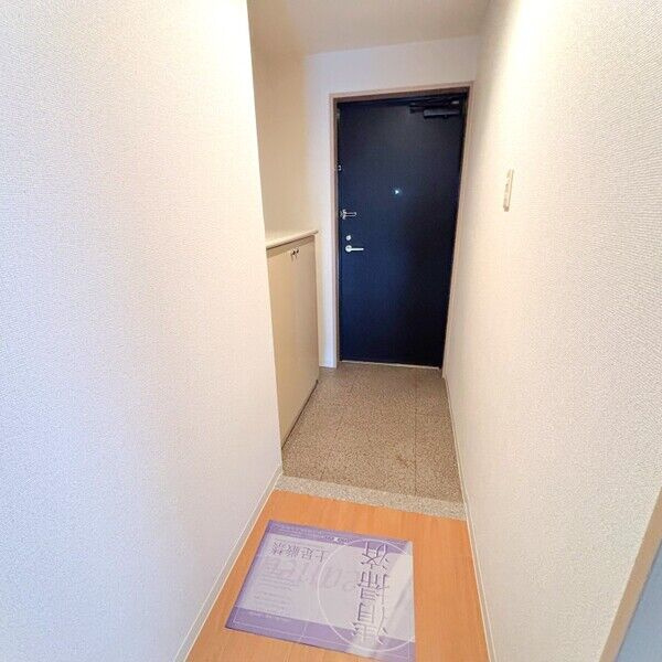 ソーラスフロント富船北棟の玄関