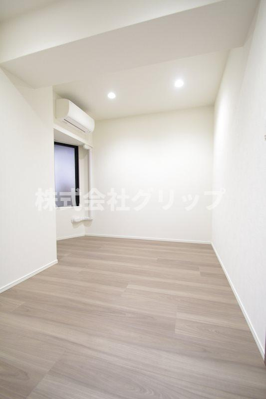 ディームス横濱青木町の洋室