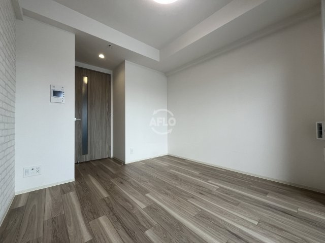 プレサンス東三国駅前グランクラスの洋室|プレサンス東三国駅前グランクラス　リビング