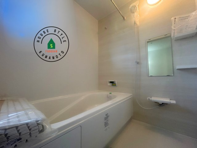 熊本市南区富合町杉島第2-2棟(1号棟)の内観：施工例|1日の疲れを癒してくれる広々バスルーム。雨の日のお洗濯にも大活躍な浴室乾燥機付です！
