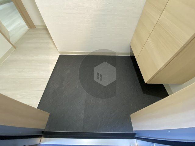 badge 長田3の玄関