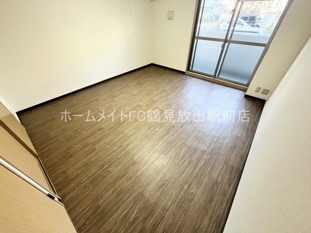 大阪市鶴見区緑１丁目の賃貸マンションの洋室