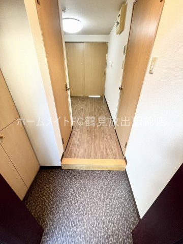 大阪市鶴見区緑１丁目の賃貸マンションの玄関