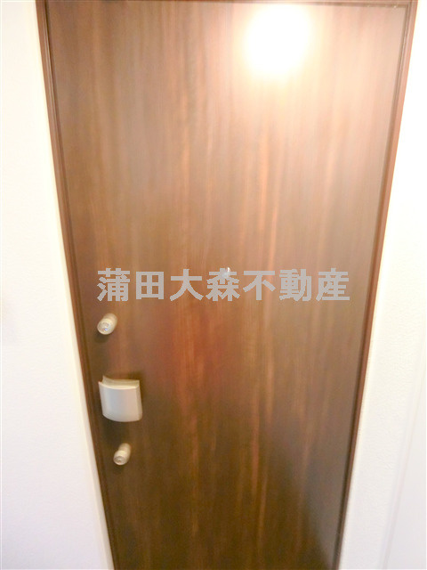 クリスタルパレス蒲西の玄関