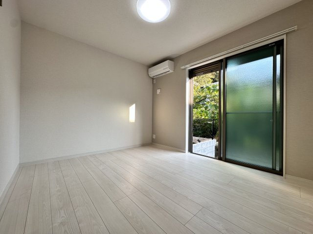 川崎市多摩区生田５丁目のアパートの居間・リビング