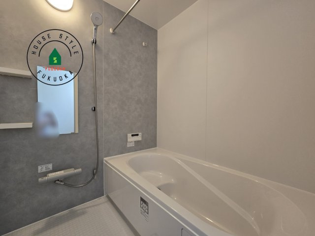 福岡市南区西長住2丁目第2-5棟（2号棟）の内観：施工例|1日の疲れを癒してくれる広々バスルーム。雨の日のお洗濯にも大活躍な浴室乾燥機付です！