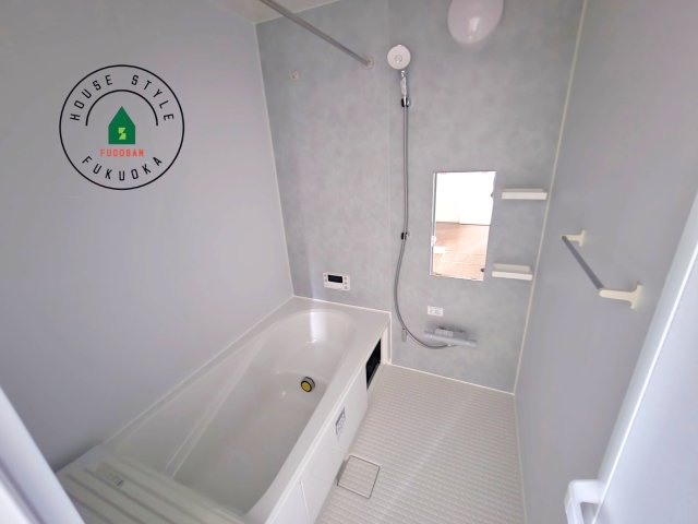 福岡市南区西長住2丁目第2-5棟（1号棟）の内観：施工例|1日の疲れを癒してくれる広々バスルーム。雨の日のお洗濯にも大活躍な浴室乾燥機付です！