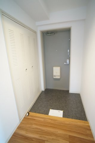 カルムエール乾の玄関