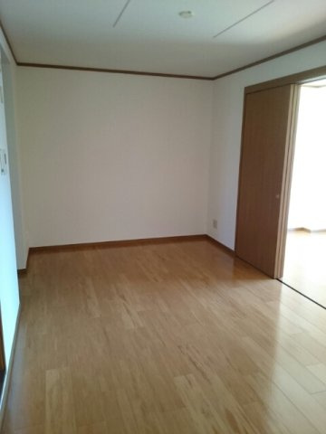 ウィスティリアＢの居間・リビング