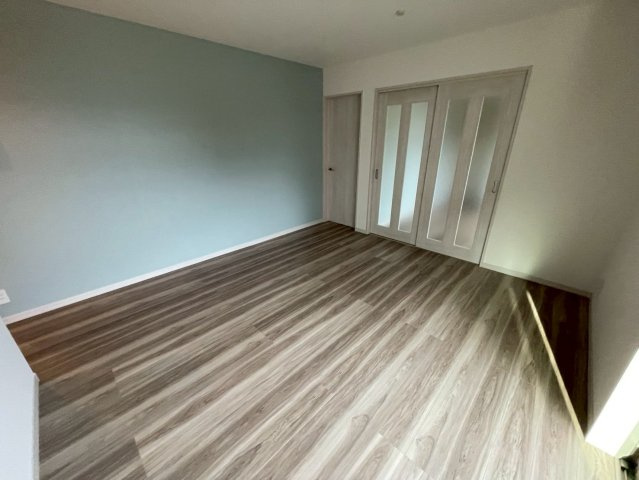 リアライズ箕岡の居間・リビング