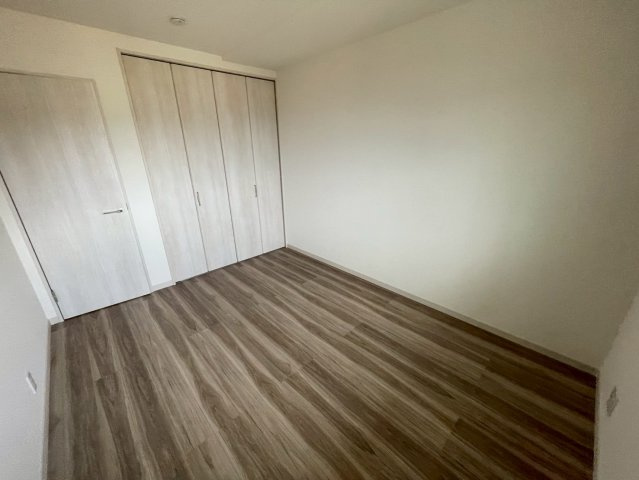 リアライズ箕岡の居間・リビング