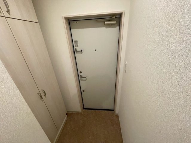 リアライズ箕岡の玄関