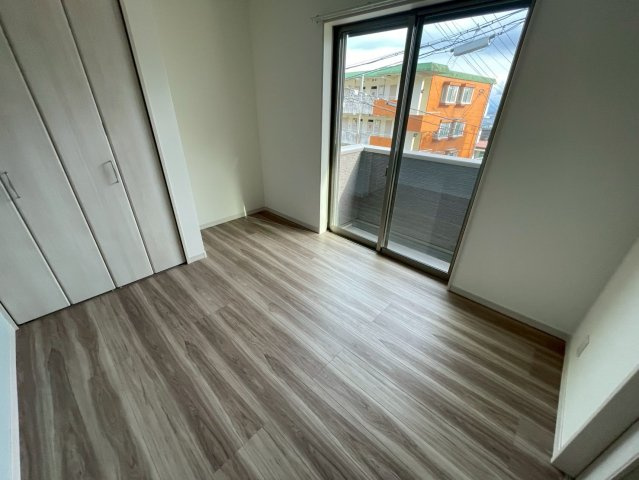 リアライズ箕岡の居間・リビング