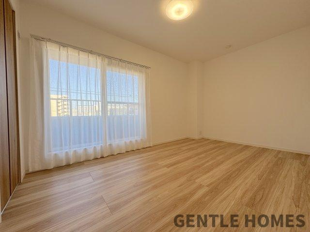 ライオンズマンション博多南の洋室