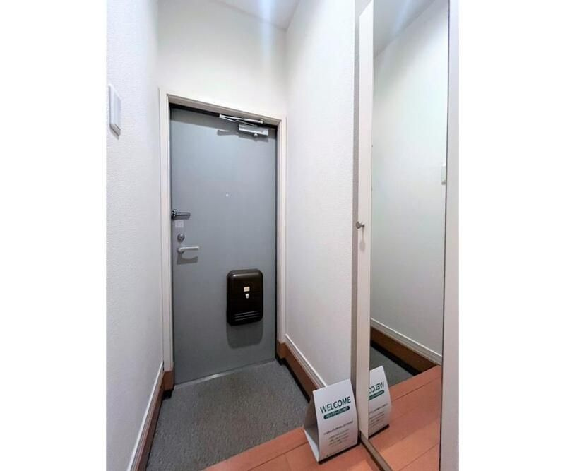 ドマーニ南大塚の玄関