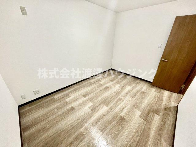 野里1丁目テラスハウスの寝室