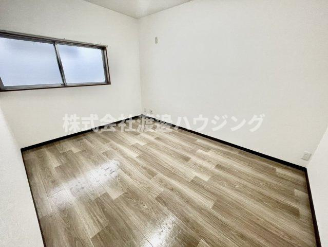 野里1丁目テラスハウスの寝室