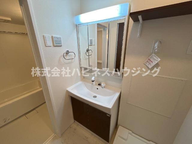 （仮称）柏市篠籠田　新築アパートの洗面所|洗髪洗面化粧台（イメージ）