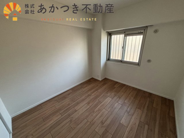 明石土山駅前スカイハイツ　B棟の洋室