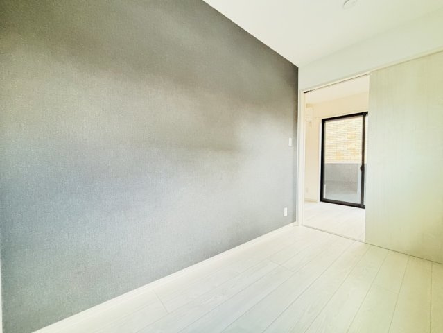 筑紫野市紫２丁目のアパートの居間・リビング