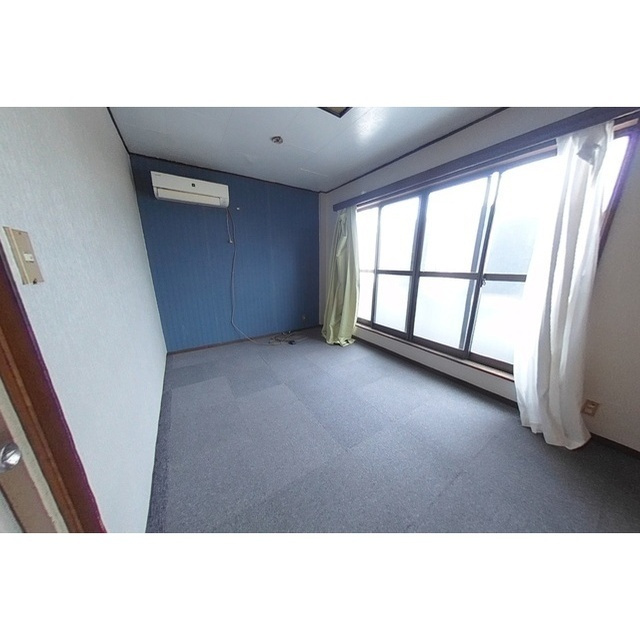 北方町北方MK住居付店舗の居間・リビング