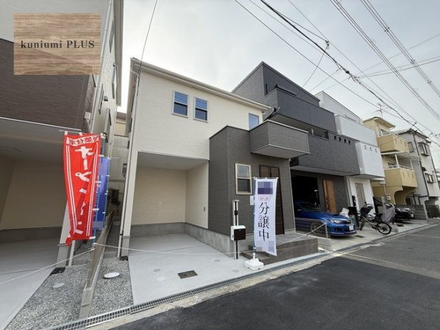 東大阪市鴻池町1丁目　1号棟の前面道路含む現地写真