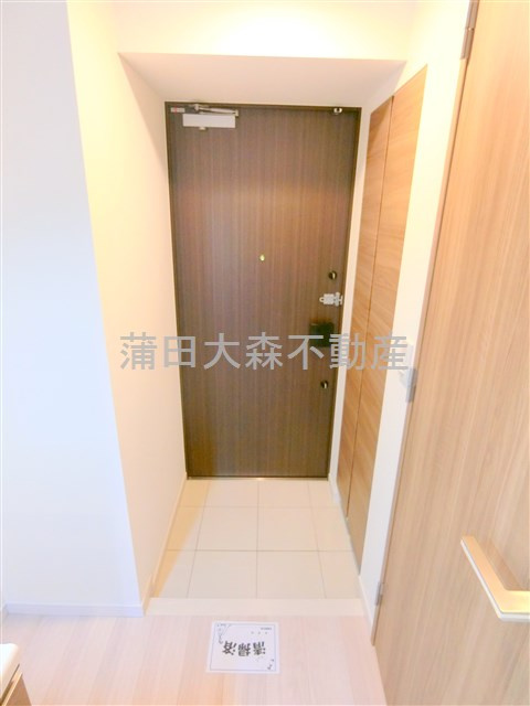 CREVISTAクレヴィスタ多摩川六郷の玄関