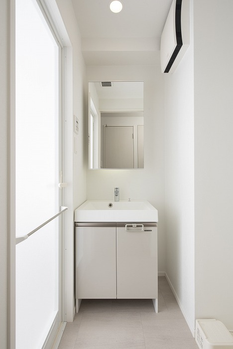 新品家具付きマンション博多駅南13A(KaGood福岡)の洗面所