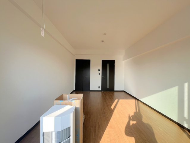 安芸郡府中町八幡２丁目の賃貸マンションの居間・リビング